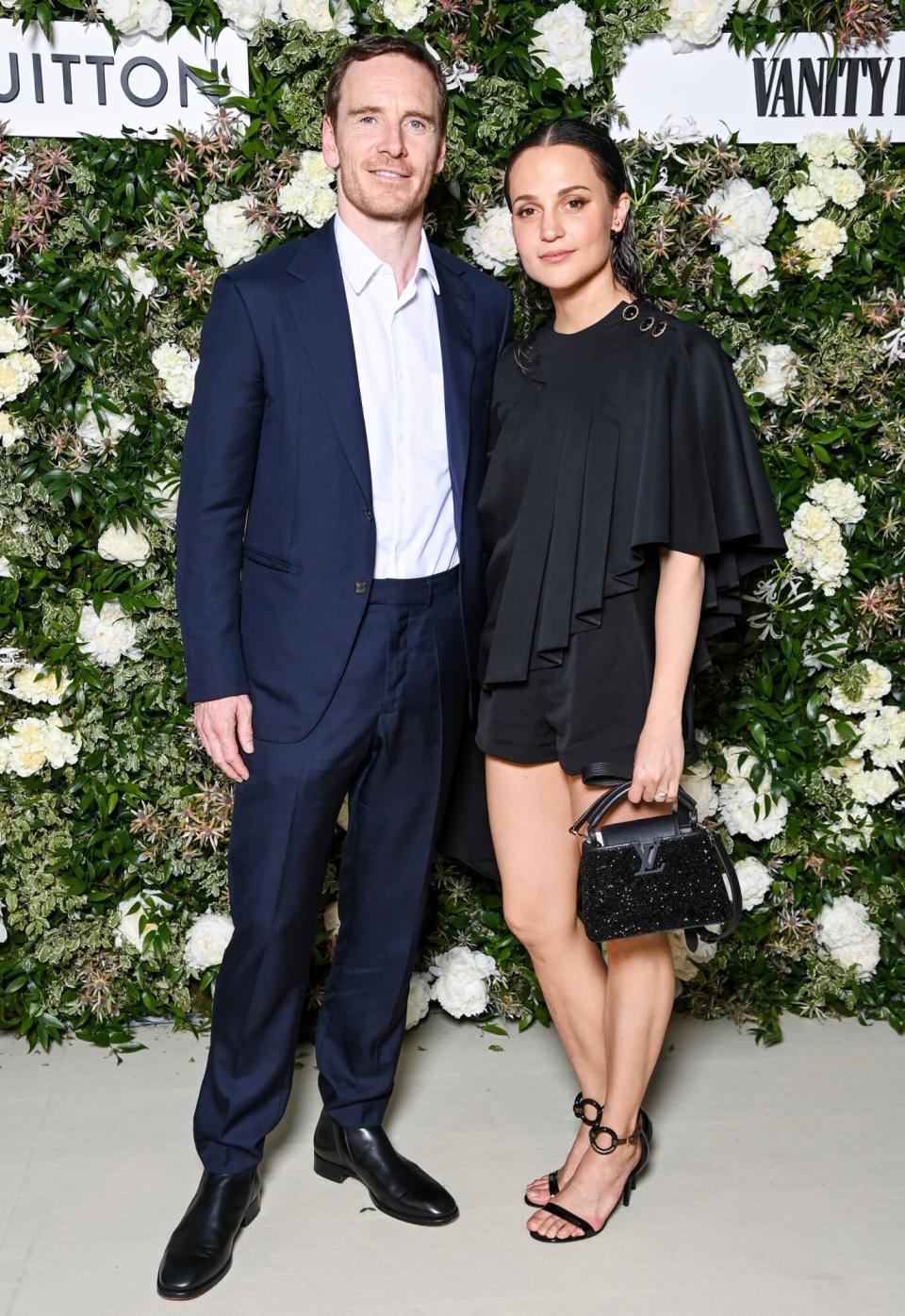 CANNES, FRANCE - MAY 20: Michael Fassbender and Alicia Vikander attend the Vanity Fair x Louis Vuitton dinner during the 75th annual Cannes Film Festival at Fred LEcailler on May 20, 2022 in Cannes, France. (Photo by Pascal Le Segretain/Getty Images for Louis Vuitton)