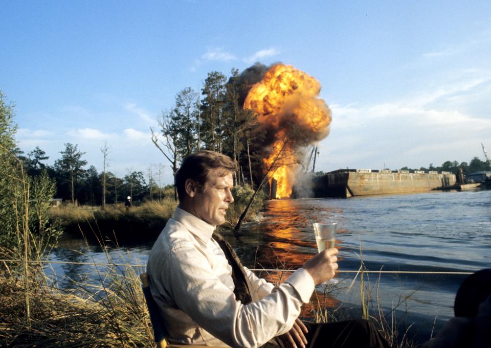 KINGSTON, JAMAICA - MARCH 1: Roger Moore on the set of the James Bond film 'Live And Let Die' on March 1, 1973 in Kingston, Jamaica..  (Photo by Anwar Hussein/Getty Images)