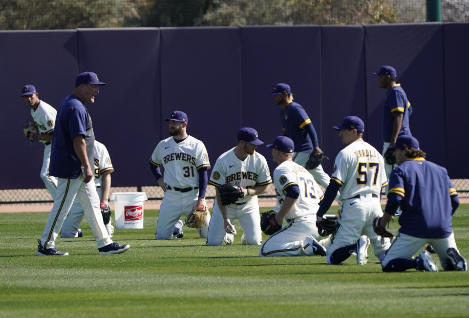 Feb 15, 2020; Phoenix, Arizona, USA; Milwaukee Brewers bench coach Pat Murphy (59) talks to the pitchers during spring training baseball in. Mandatory Credit: Rick Scuteri-USA TODAY Sports