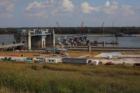 Construction of the new Olmsted Locks and Dam continues on the Ohio River in Olmsted, Illinois, U.S., September 19, 2017. According to the U.S. Army Corps of Engineers, Olmsted Locks and Dam will replace locks and dams 52 and 53 and will be operational in 2018. Photograph taken at N37°11.131' W89°04.053'. Photo taken September 19, 2017. REUTERS/Brian Snyder