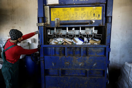 An employee works at a recycling factory in Belgrade, Serbia, February 28, 2019. Picture taken February 28, 2019. REUTERS/Marko Djurica