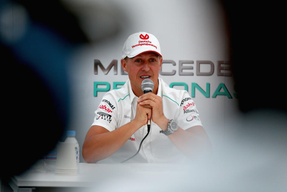 SUZUKA, JAPAN - OCTOBER 04: Michael Schumacher of Germany and Mercedes GP announces his retirement at the end of the season during previews for the Japanese Formula One Grand Prix at the Suzuka Circuit on October 4, 2012 in Suzuka, Japan. (Photo by Clive Mason/Getty Images)