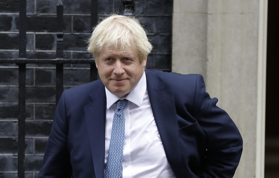 Britain's Prime Minister Boris Johnson leaves10 Downing Street in London, Thursday, Sept. 26, 2019. An unrepentant Prime Minister Boris Johnson brushed off cries of "Resign!" and dared his foes to try to topple him Wednesday at a raucous session of Parliament, a day after Britain's highest court ruled he acted illegally in suspending the body ahead of the Brexit deadline. (AP Photo/Kirsty Wigglesworth)