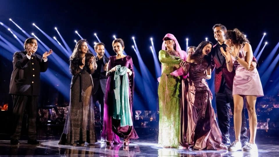 Rihanna on stage alongside the bride, groom, members of the Ambani family and other guests. - Reliance Industries/Handout/Reuters