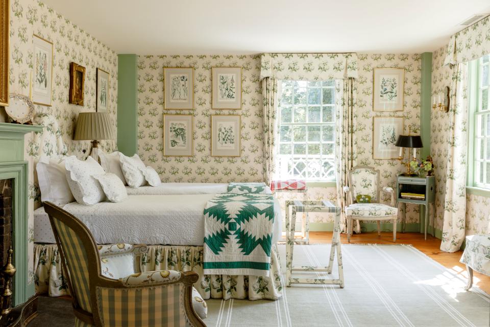 In the “green room,” one of Steinhart’s favorites, Colefax and Fowler’s Bowood print is featured on the window treatments and the wallpaper. The prints on the wall are all 17th-century German botanicals.