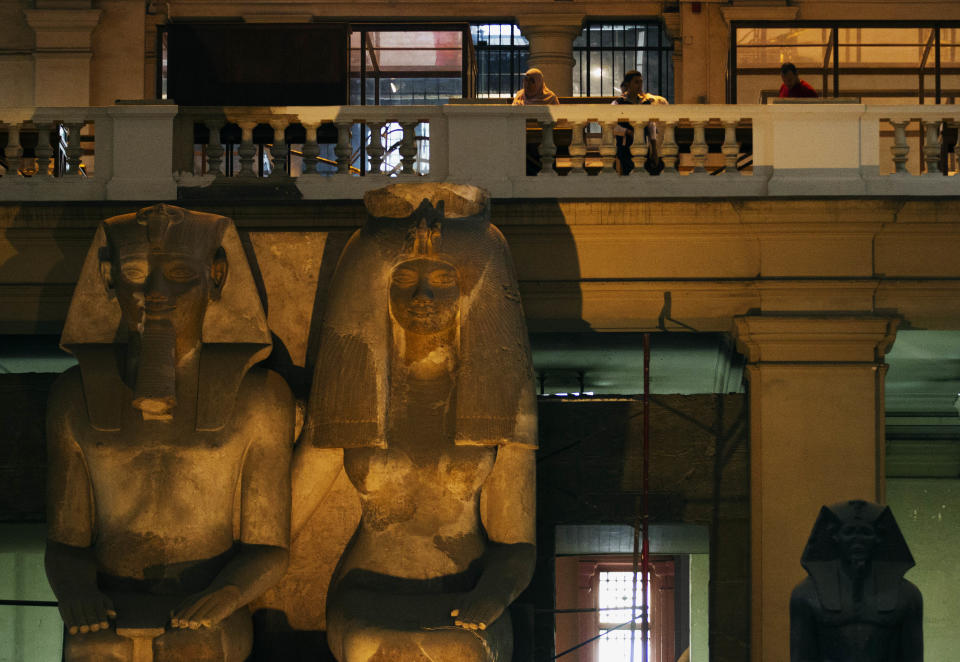 Guests participating in a tour walk around the Egyptian Museum after its renovation project announcement in downtown Cairo, Egypt, Friday, Nov. 15, 2013. Egypt unveiled Friday an ambitious renovation project for its Cairo’s famed Egyptian Museum, in a bid to show that the Arab world’s most populous country was regaining a sense of normalcy after months of unrest. (AP Photo/Hiro Komae)