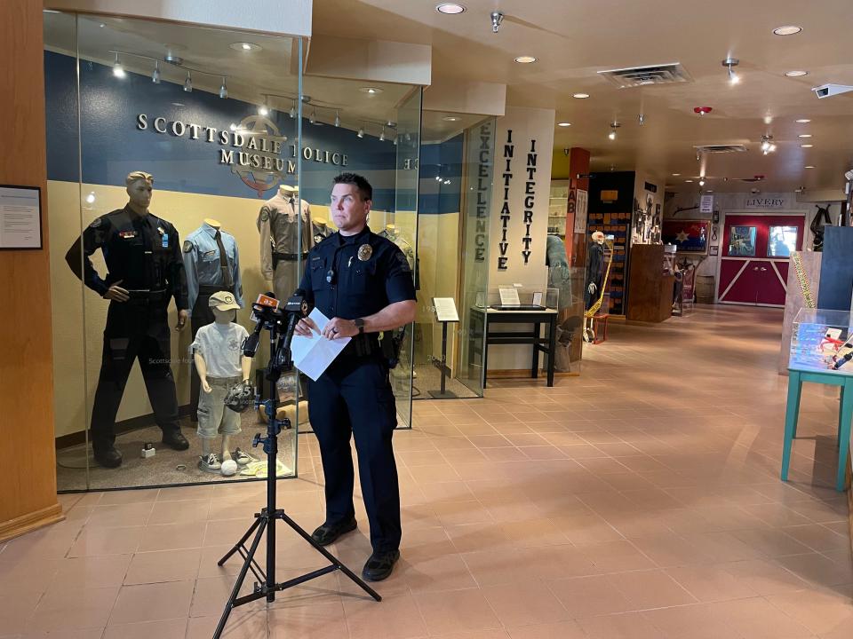 Scottsdale police Officer Aaron Bolin thanks the community for its help during a Jan. 28, 2023, news conference after announcing that a suspect in several Molotov cocktail fire incidents was arrested.