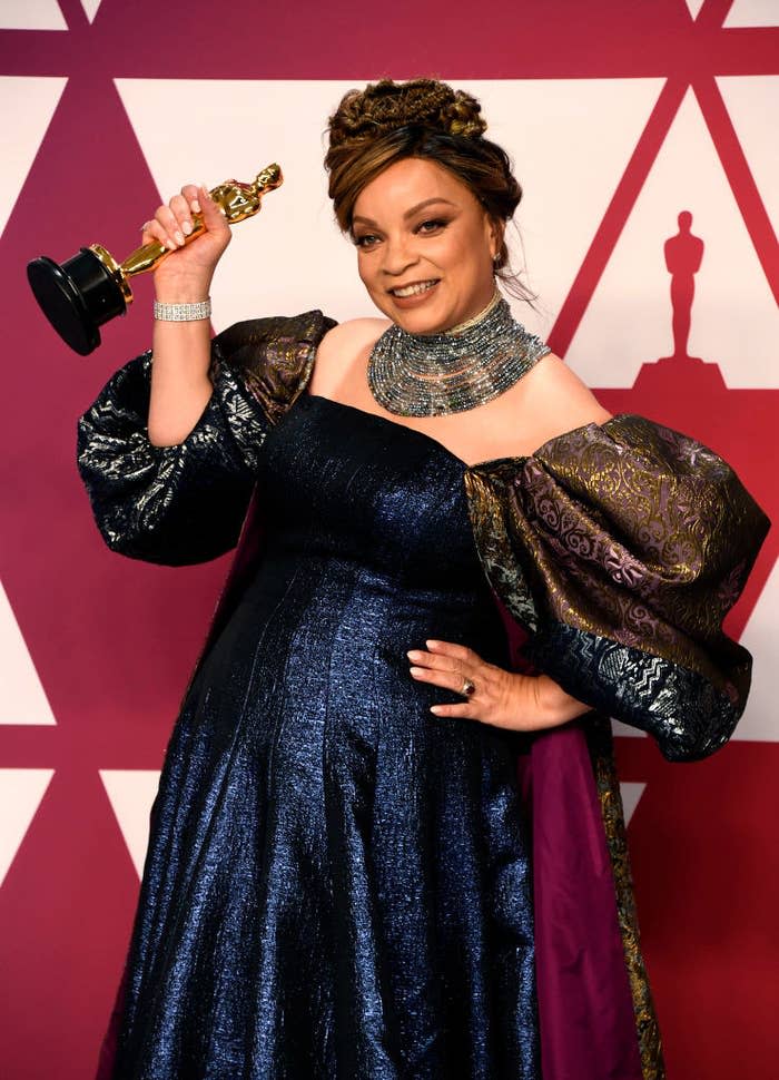 Ruth E. Carter holding her Oscar