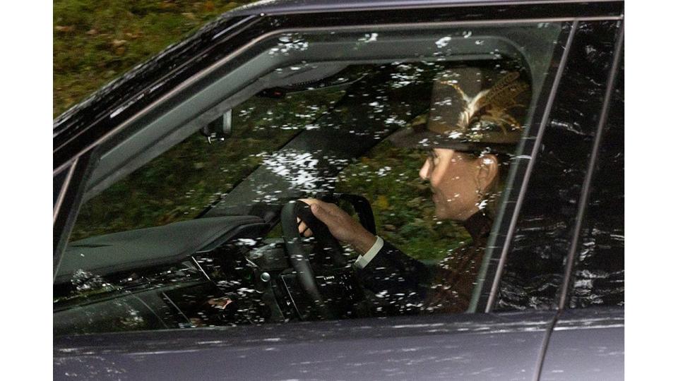 Princess Kate smiling as she drives to Crathie Kirk