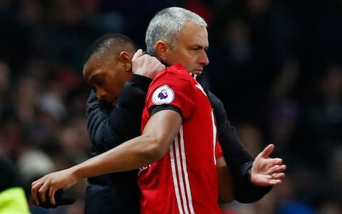 Mourinho gives Martial a hug - Credit: Reuters