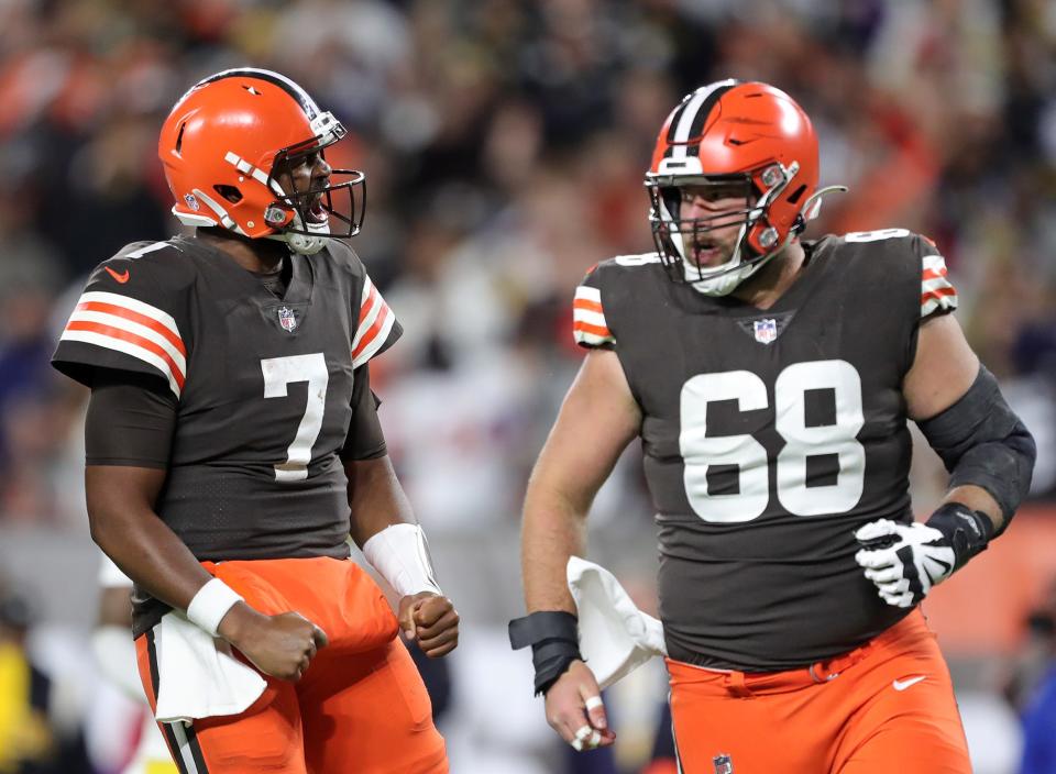 Cleveland Browns quarterback Jacoby Brissett (7) celebrates with guard Michael Dunn (68)  after rushing for a first down during the second half against the Pittsburgh Steelers.