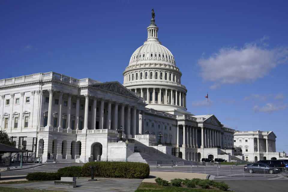 FILE - In this Nov. 2, 2020, file photo sunlight shines on the U.S. Capitol building on Capitol Hill in Washington. President-elect Joe Biden wants to “restore the soul of America.” First, he'll need to fix a broken and divided Congress. (AP Photo/Patrick Semansky, File)