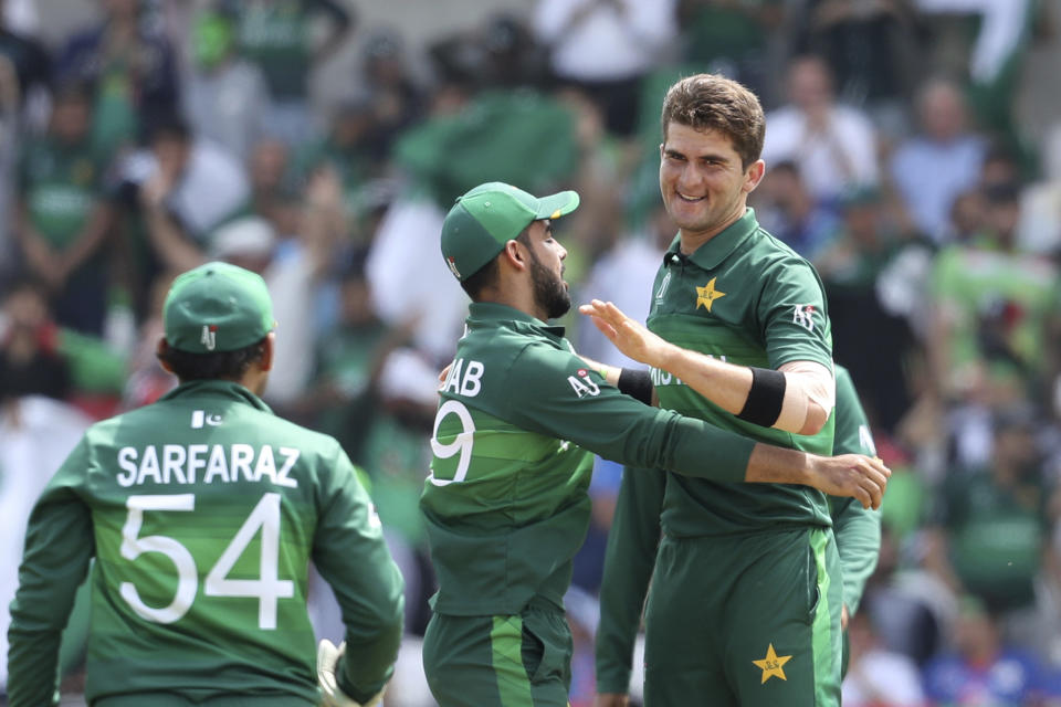 Pakistan's Shaheen Afridi, right, celebrates after the dismissal of Afghanistan's Najibullah Zadran during the Cricket World Cup match between Pakistan and Afghanistan at Headingley in Leeds, England, Saturday, June 29, 2019. (AP Photo/Rui Vieira)