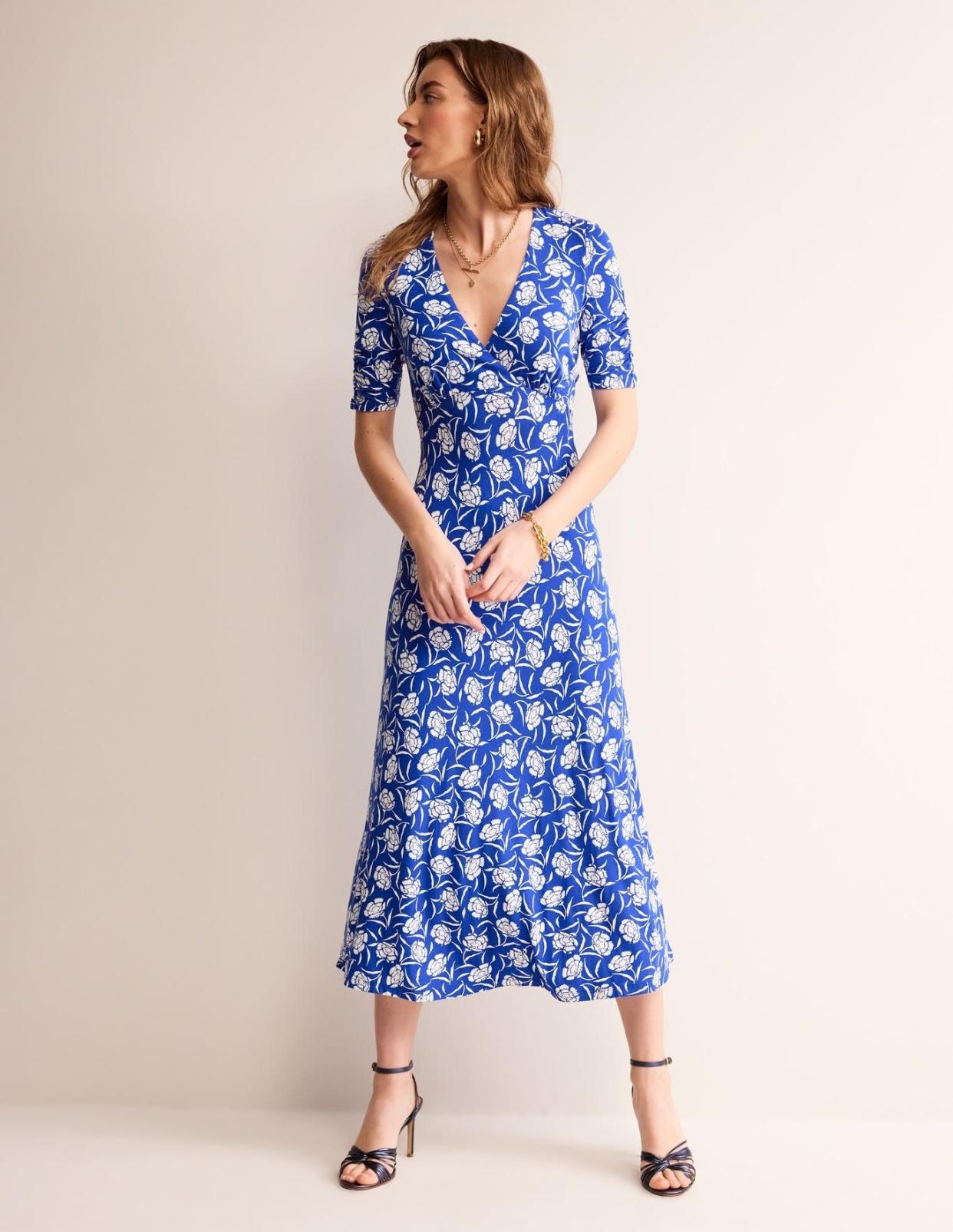 <p><a href="https://go.redirectingat.com?id=74968X1596630&url=https%3A%2F%2Fwww.bodenusa.com%2Fen-us%2Frebecca-jersey-midi-tea-dress-surf-the-web-peony-sprig%2Fsty-d0581-aqu%3Fcat%3DC1_S2_G4&sref=https%3A%2F%2Fwww.thepioneerwoman.com%2Ffashion-style%2Fg38942328%2Fcute-spring-dresses%2F" rel="nofollow noopener" target="_blank" data-ylk="slk:Shop Now;elm:context_link;itc:0;sec:content-canvas" class="link rapid-noclick-resp">Shop Now</a></p><p>Rebecca Jersey Midi Tea Dress</p><p>$120.00</p><span class="copyright">Boden</span>