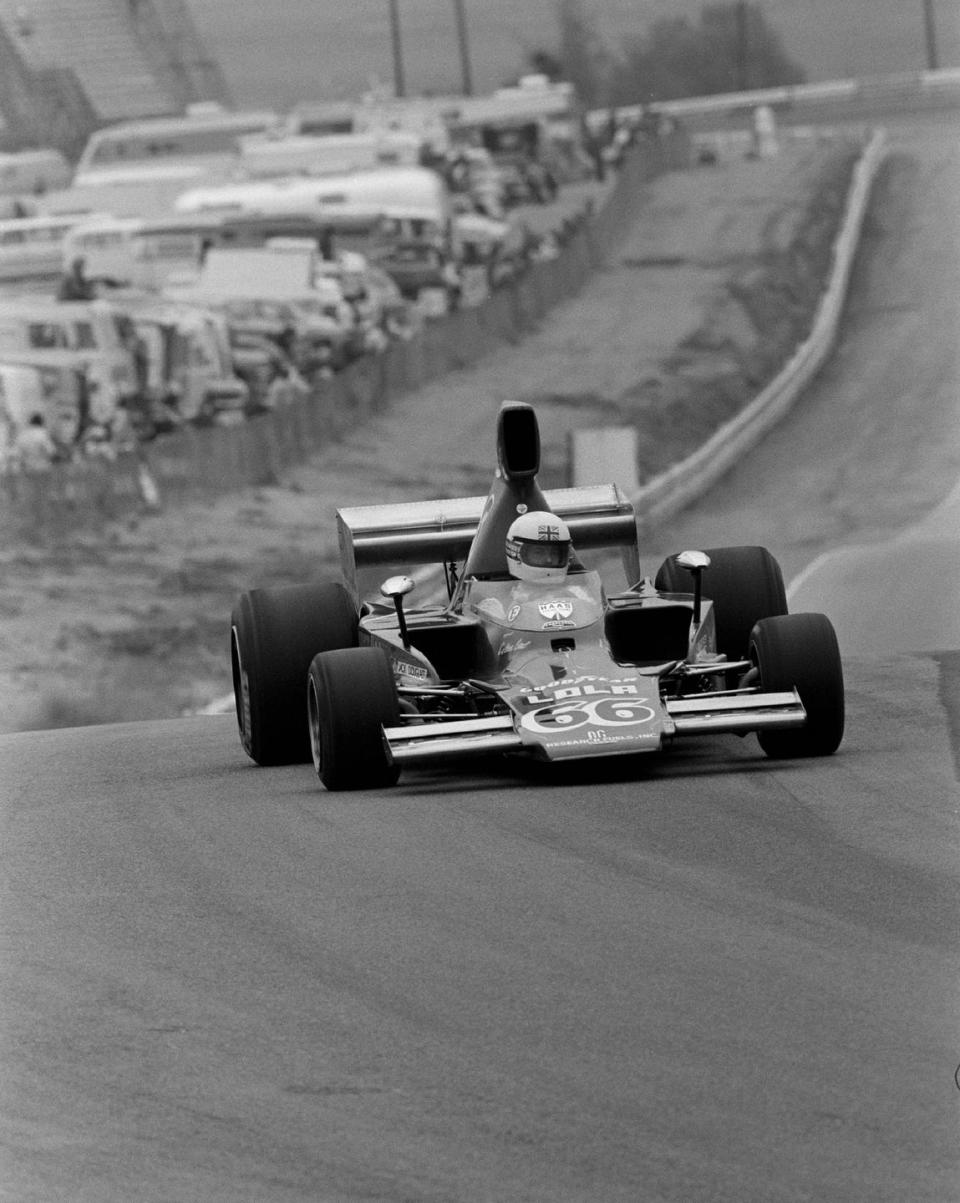 a chevrolet powered lola t332 in the hands of brian redman at riverside in 1974