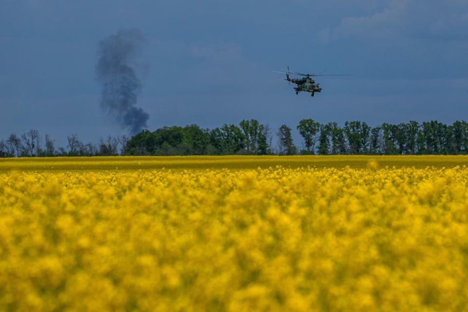 A Ukrainian Mi-8 helicopter returns from a combat operation at the frontline in Kharkiv region, Ukraine (AP)