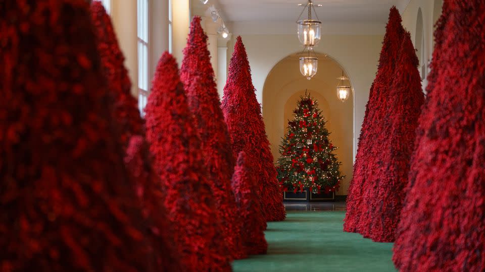 <strong>2018</strong>: Melania Trump's cranberry topiary trees, pictured here in the East Colonnade, were scrutinized online. - Carolyn Kaster/AP