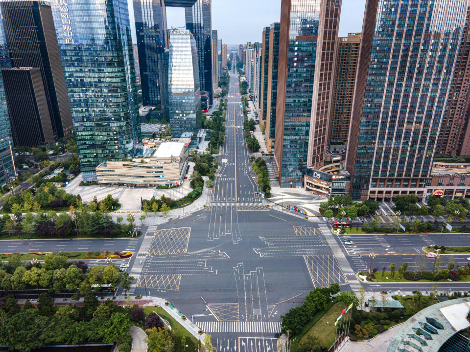 CHENGDU, CHINA - SEPTEMBER 03: Aerial view of an empty street on September 3, 2022 in Chengdu, Sichuan Province of China. Residents in Chengdu are required to stay home in an effort to curb further expansion of an ongoing COVID-19 outbreak in the city. (Photo by Wu Ke/VCG via Getty Images)