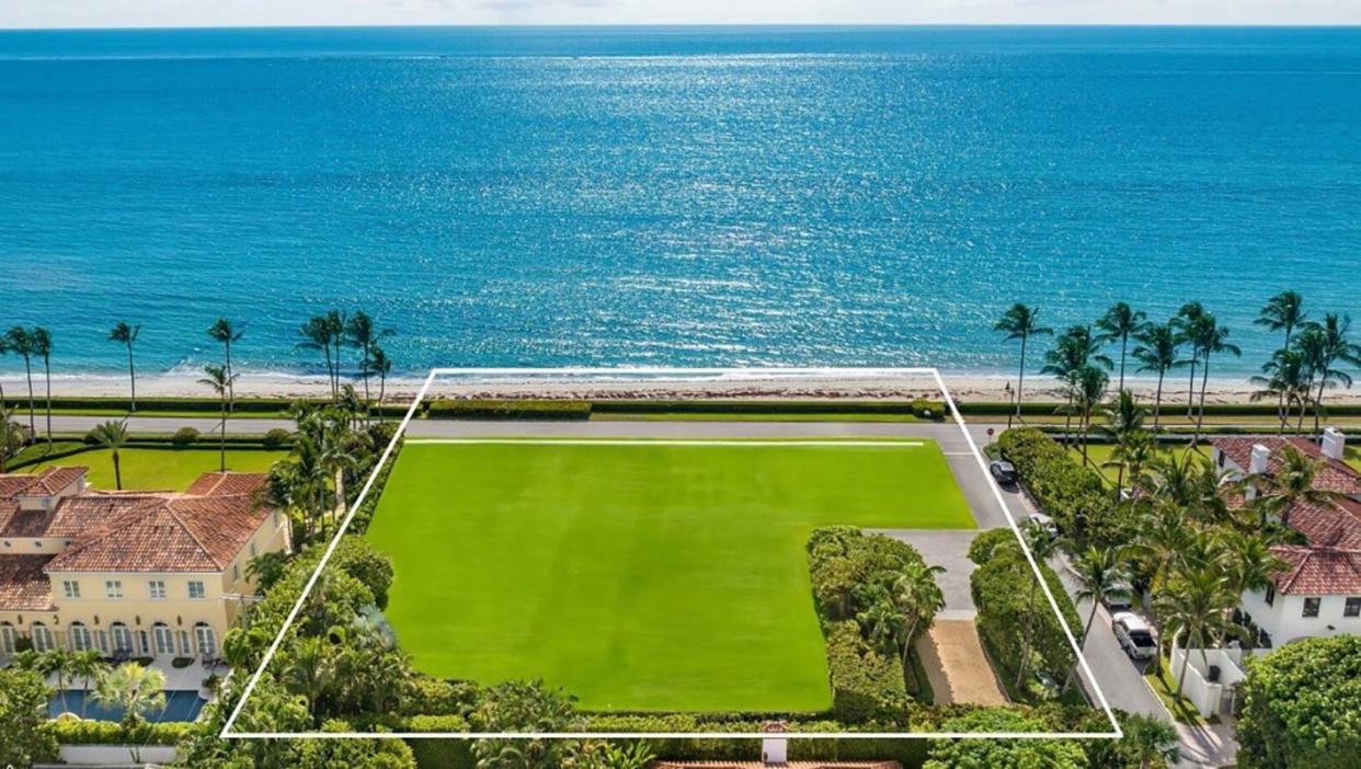 A digitally altered photo shows how an oceanfront property at 101 Jungle Road in Palm Beach might look if the house there were demolished and the land planted with grass.