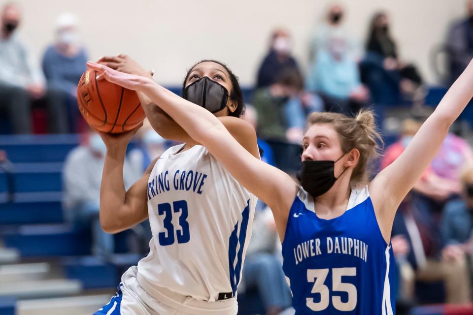 Spring Grove's Laila Campbell drives to the basket to score on a layup in the first quarter against Lower Dauphin in a PIAA District 3 Class 5A semifinal game at Spring Grove Area High School on Wednesday, March 10, 2021. 