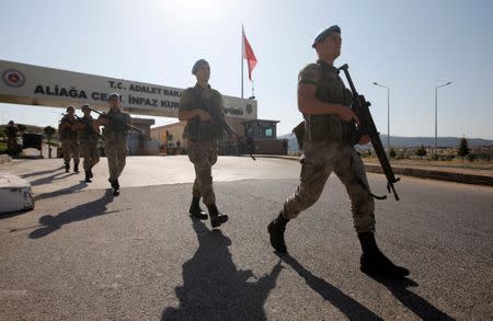 Turkish soldiers patrol outside the Aliaga Prison and Courthouse complex in Izmir, Turkey July 18, 2018. REUTERS/Kemal Aslan