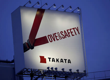FILE PHOTO: A billboard advertisement of Takata Corp is pictured in Tokyo September 17, 2014. REUTERS/Toru Hanai/File Photo