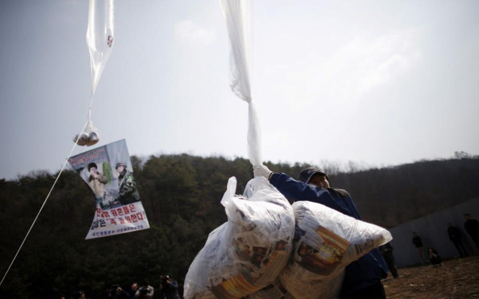 Pyongyang cut communications with South Korea this week over its anger at defectors sending propapanda leaflets over the border into the North - REUTERS
