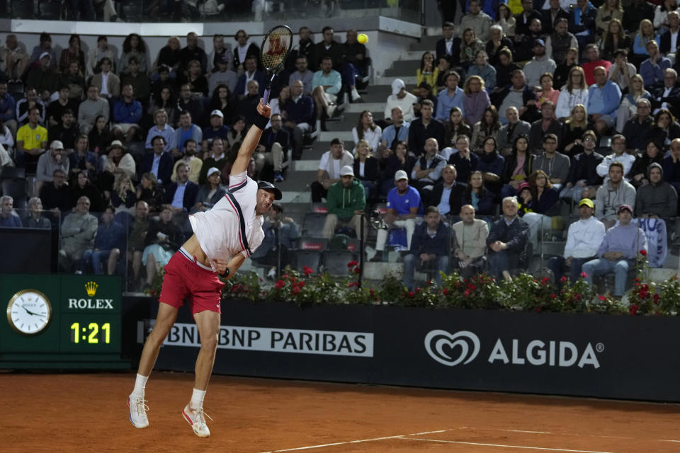 Nicolas Jarry of Chile serves the ball to Tommy Paul of the United States during their tennis semifinal match at the Italian Open tennis tournament, in Rome, Friday, May 17, 2024. (AP Photo/Andrew Medichini)