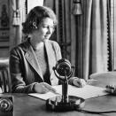 <p>A 14-year-old Elizabeth appears on the radio in a programme called Children’s Hour (PA Archive) </p>