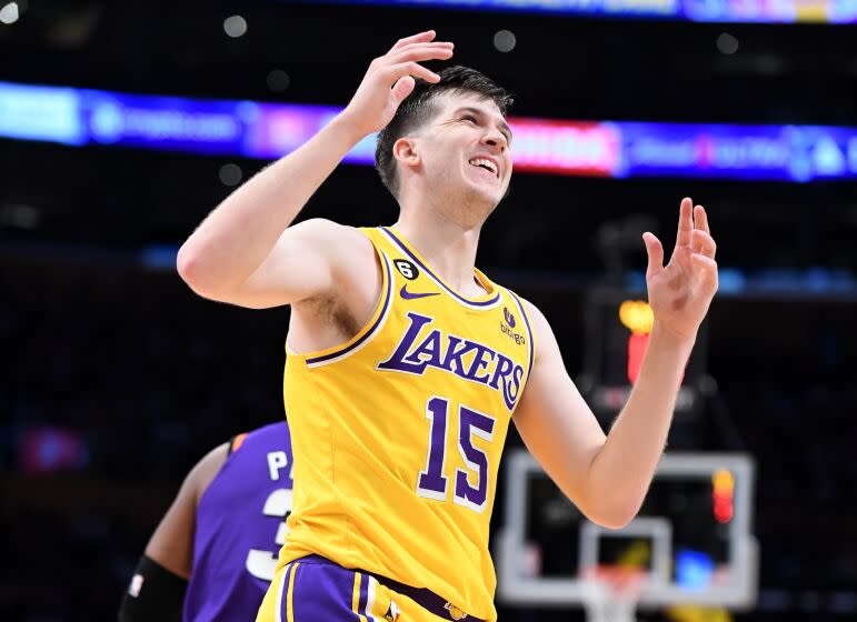 Los Angeles, California March 22, 2023-Lakers Austin Reaves reacts after being fouled against the Suns at Crypto.com arena Wednesday. (Wally Skalij/Los Angeles Times)