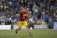 Southern California running back Raleek Brown passes during the second half of an NCAA college football game against UCLA Saturday, Nov. 19, 2022, in Pasadena, Calif. (AP Photo/Mark J. Terrill)