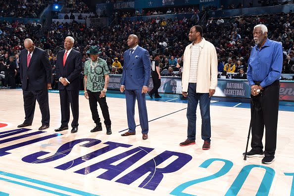 CHARLOTTE, NC - FEBRUARY 17: NBA legends George Gervin, Julius Erving, Allen Iverson, Magic Johnson, David Robinson, and Bill Russell are honored during the 2019 NBA All-Star Game on February 17, 2019 at the Spectrum Center in Charlotte, North Carolina. NOTE TO USER: User expressly acknowledges and agrees that, by downloading and/or using this photograph, user is consenting to the terms and conditions of the Getty Images License Agreement. Mandatory Copyright Notice: Copyright 2019 NBAE (Photo by Andrew D. Bernstein/NBAE via Getty Images)