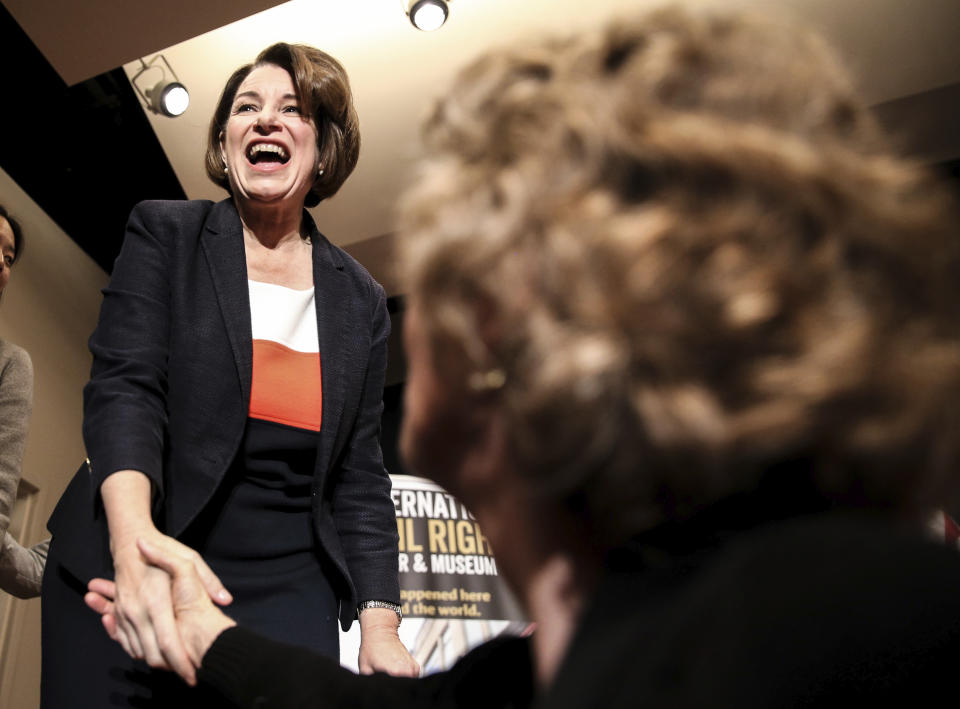 Democratic presidential candidate U.S. Sen. Amy Klobuchar, D-Minn., shakes hands with a supporter after a roundtable discussion on voting rights at the International Civil Rights Center & Museum in Greensboro, N.C., on Thursday, Feb. 27, 2020. (Khadejeh Nikouyeh/News & Record via AP)