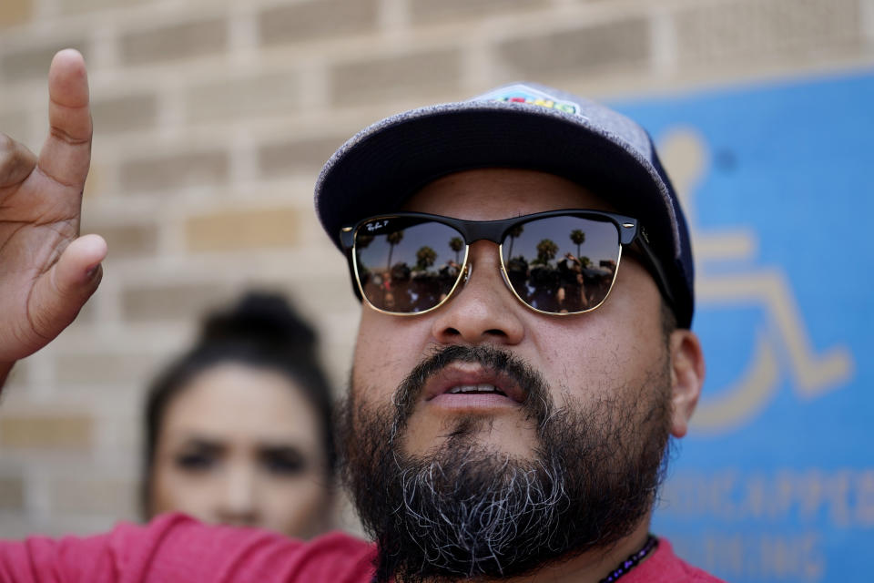 Alfred Garza III, father of school shooting victim Amerie Jo Garza, talks with the media following a special emergency city council meeting to reissue the mayor's declaration of local state of disaster due to the recent school shooting at Robb Elementary School, Tuesday, June 7, 2022, in Uvalde, Texas. (AP Photo/Eric Gay)