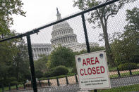 A security fence borders the U.S. Capitol ahead of a rally in Washington, Saturday, Sept. 18, 2021. The rally was planned by allies of former President Donald Trump and aimed at supporting the so-called "political prisoners" of the Jan. 6 insurrection at the U.S. Capitol. (AP Photo/Nathan Howard)