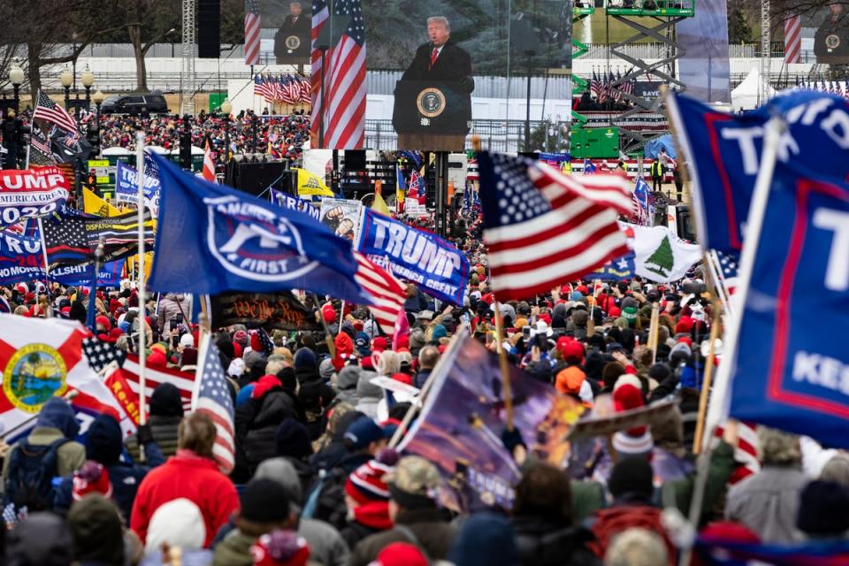 The ‘Appeal To Heaven’ flag, seen middle right, was used by supporters of Donald Trump as part of their ‘Stop The Steal’ campaign (Getty Images)