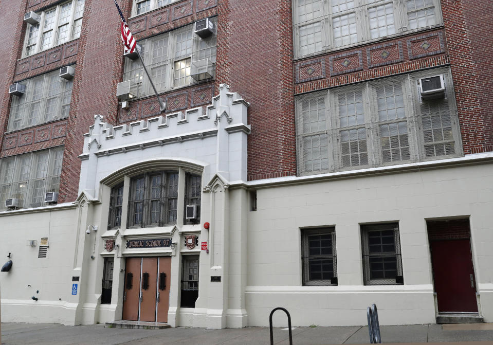 This July 11, 2019, photo shows the entrance to Bard High School, a public college prep high school with ties to Bard College, on the Lower East Side of New York. In the decade since striking a plea deal that required Financier Jeffrey Epstein to register as a child sex offender, he has sought to underwrite all manner of youth causes, such as a baseball program and the school. (AP Photo/Kathy Willens)