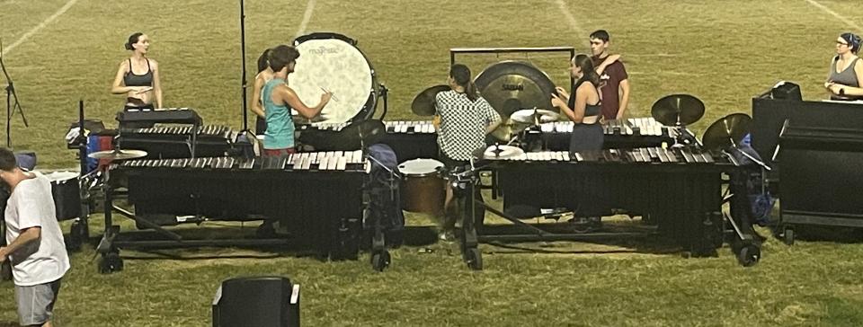 Music City Drum and Bugle Corp Pit Crew give it their all during rehearsal.