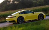 <p>As with many new cars today, the 992's tailpipes are not physically connected to the exhaust-finishing outlets, a design that Porsche says helps to lessen repair costs for rear-end impacts.</p>