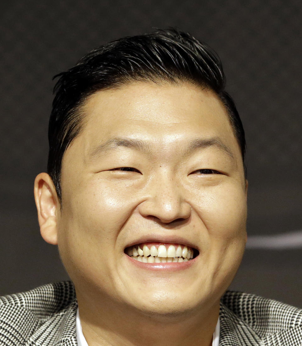 South Korean rapper PSY, who sings the popular "Gangnam Style" song, smiles during a press conference in Seoul, South Korea, Tuesday, Sept. 25, 2012. (AP Photo/Lee Jin-man)