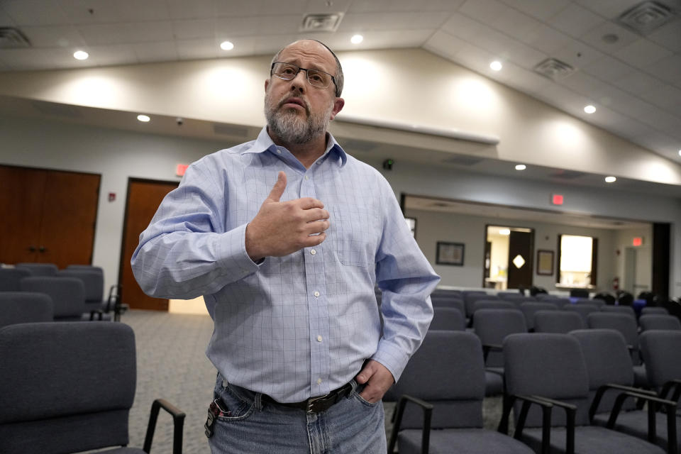 In this Dec. 22, 2022, photo, Shane Woodward talks about his hostage experience at Congregation Beth Israel in Colleyville, Texas. A year ago, a rabbi and three others survived a hostage standoff at their synagogue in Colleyville, Texas. Their trauma did not disappear, though, with the FBI's killing of the pistol-wielding captor. Healing from the Jan. 15, 2022, ordeal is ongoing. (AP Photo/Tony Gutierrez)