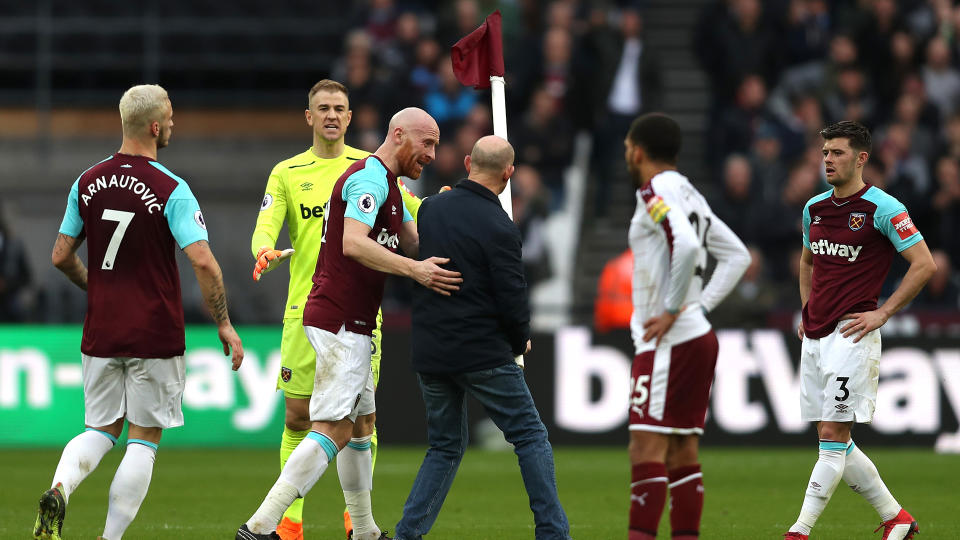 Supporters’ anger spilled over onto the pitch as Saturday’s defeat to Burnley was interrupted several times