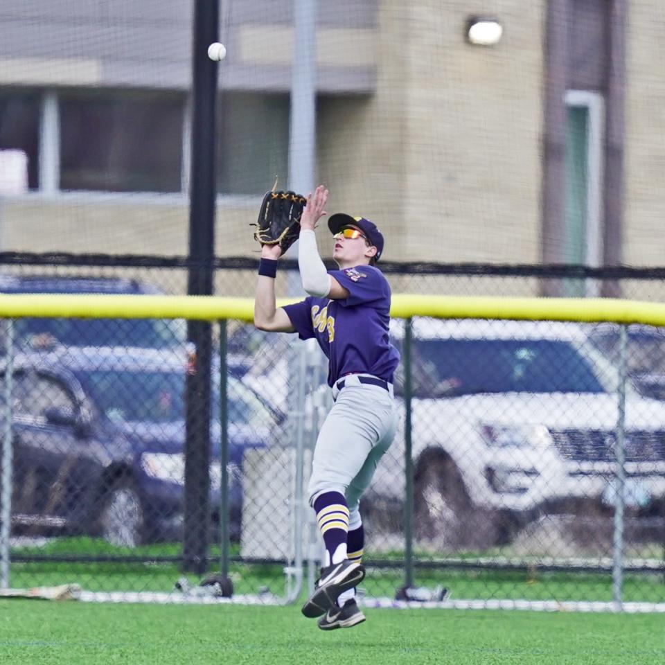 Barrington's Quinn Murphy chases down a fly ball during Monday's game against East Providence.