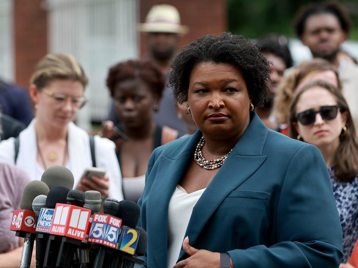 Democratic gubernatorial candidate Stacey Abrams speaks to the media during a press conference