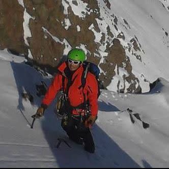 Gilian Lee pictured climbing mountain.