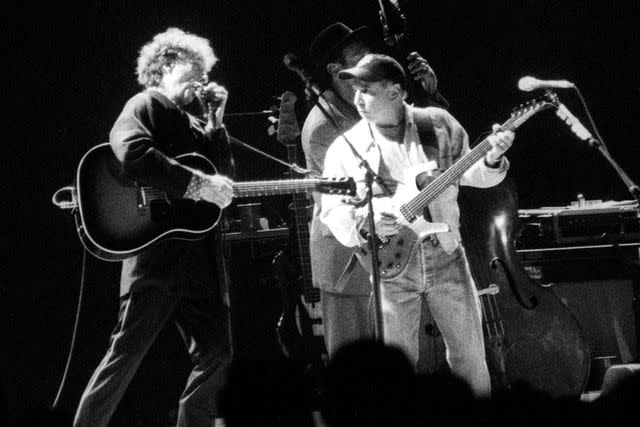 Larry Hulst/Michael Ochs Archives/Getty Images Paul Simon on Tour with Bob Dylan