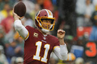 Washington Redskins quarterback Alex Smith (11) passes the ball during the first half of an NFL football game against the Green Bay Packers, Sunday, Sept. 23, 2018, in Landover, Md. (AP Photo/Carolyn Kaster)