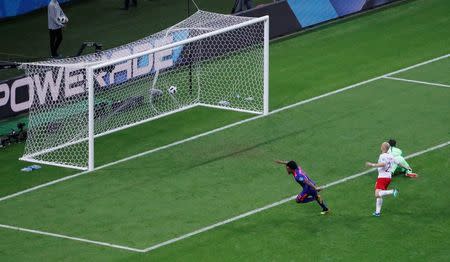 Soccer Football - World Cup - Group H - Poland vs Colombia - Kazan Arena, Kazan, Russia - June 24, 2018 Colombia's Juan Cuadrado scores their third goal REUTERS/Jorge Silva