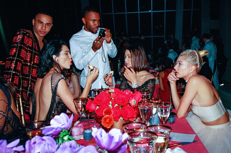 2018 - Cameraman Frank Ocean presides over a renaissance spread of Kendall Jenner, Bella Hadid and Hailey Bieber as they sample the appetizers.