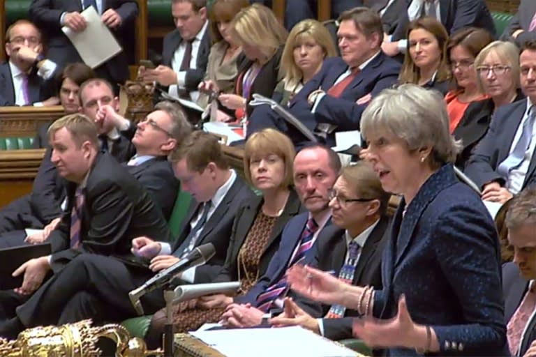 Theresa May imparting 'good news' to lawmakers